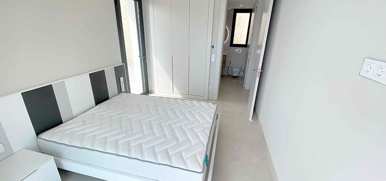 bedroom with bathroom ensuite